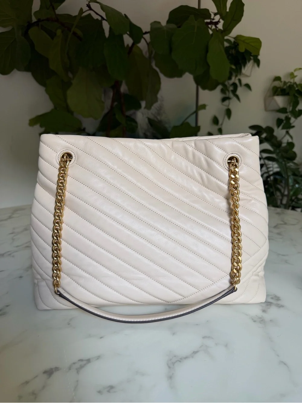 Tory Burch excellent she